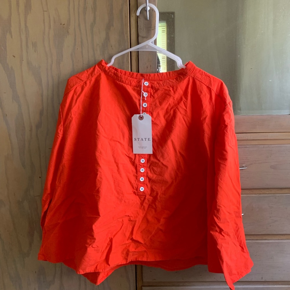 state the label pullover top in punch red